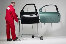 Support pour éléments carrosserie